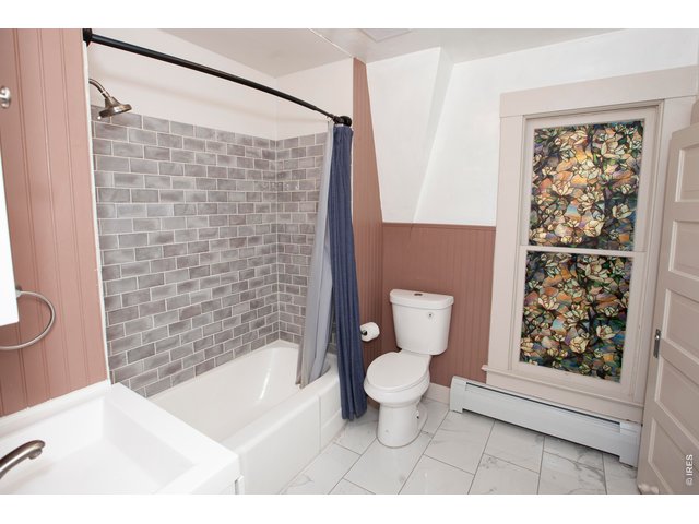 Property Photo 29 Upstairs Full Bathroom w/storage closet