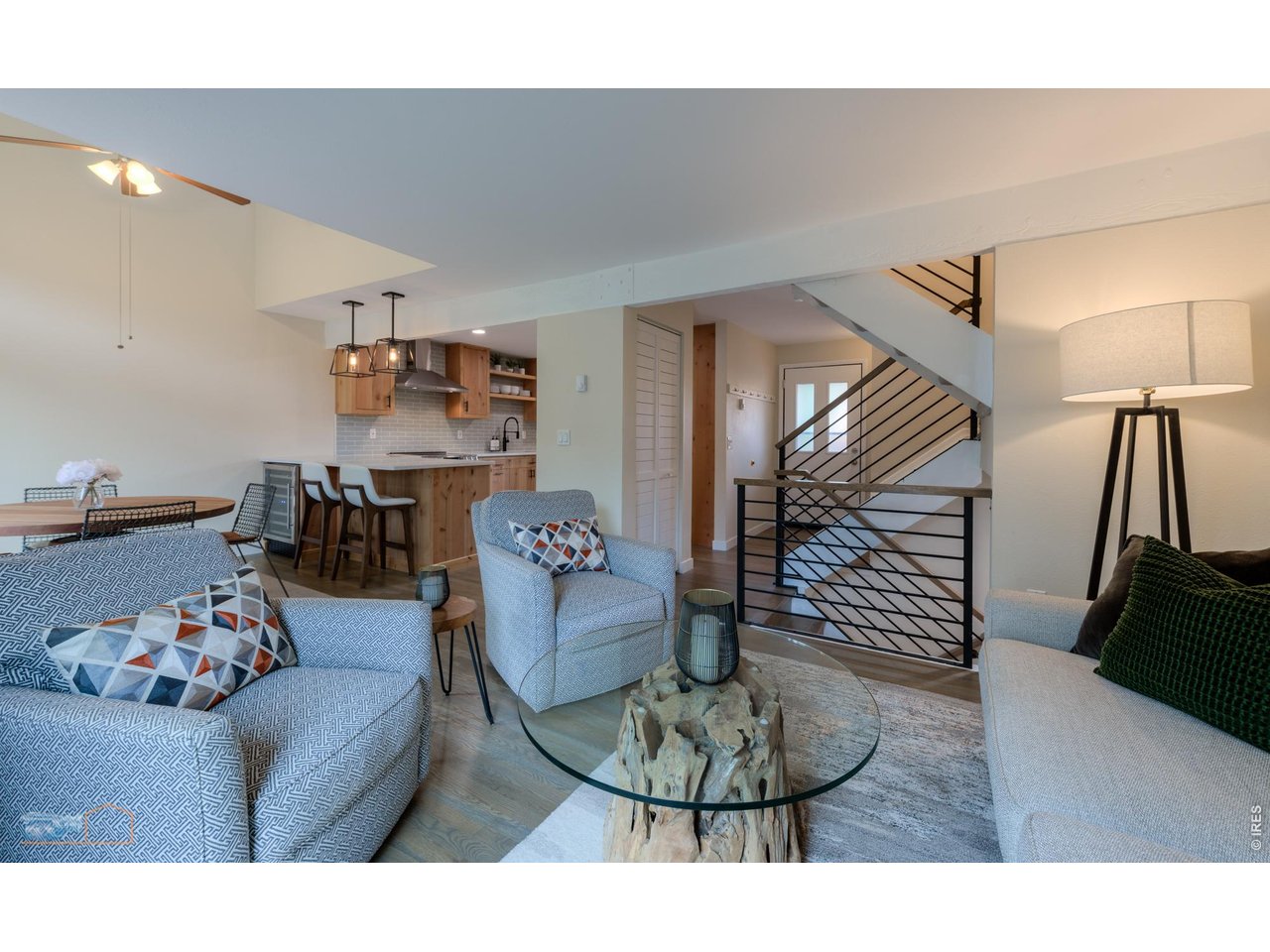 Comfortable main level with remodeled kitchen, new White Oak hardwood floors, new lighting, and lots of light!