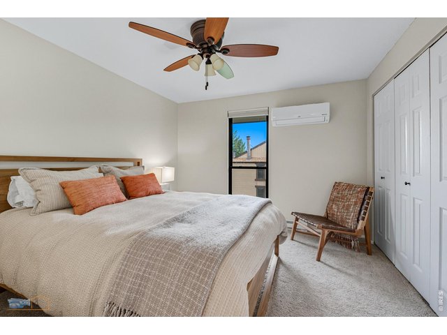 Property Photo 19 2nd bedroom on the upper level with a split-unit for cooling
