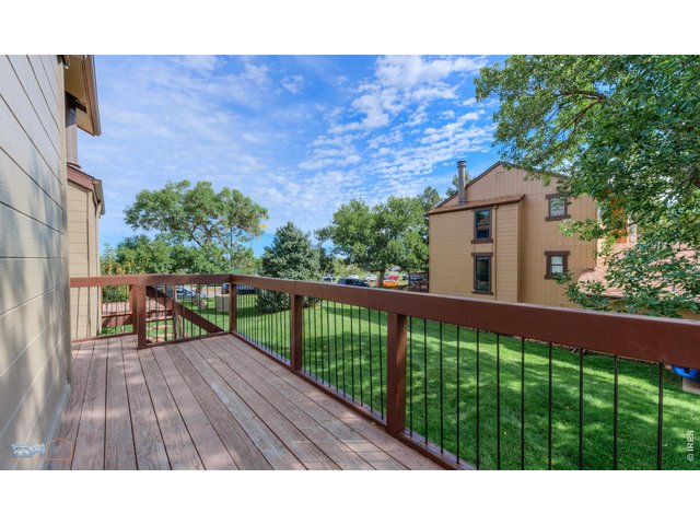 Property Photo 31 Large back deck overlooking neighborhood green space
