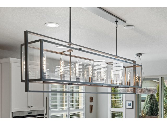 Property Photo 11 Upgraded lighting throughout the home creates a showcase and elevates each space