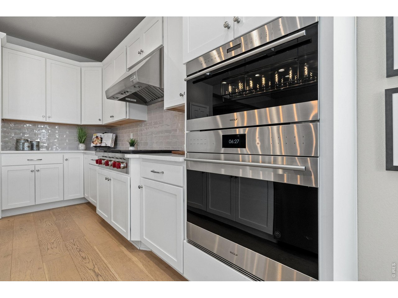 A professional suite of Wolf stainless steel appliances elevates every culinary experience.