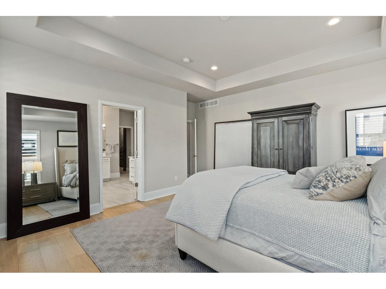 The main-level primary suite is a sanctuary of calm. 