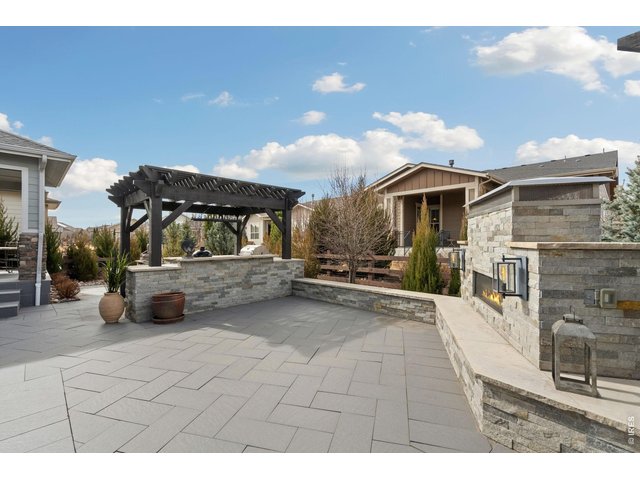 Property Photo 4 Whether hosting summer soir es or enjoying quiet evenings under the stars, this outdoor retreat transforms everyday living into an experience.