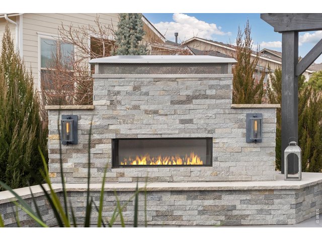 Property Photo 5 Linear gas fireplace for year-round ambiance