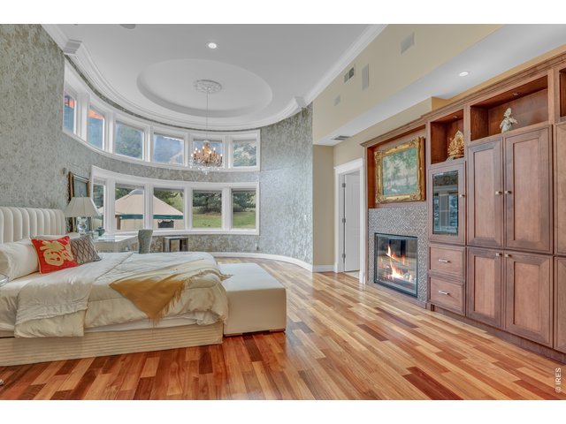 Property Photo 17 The luxurious primary suite captures breathtaking views 