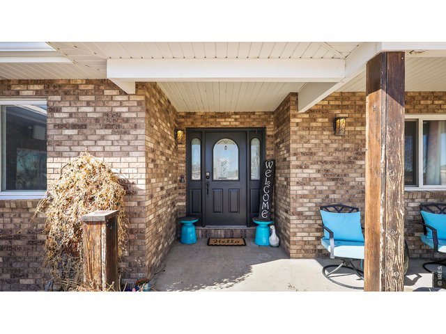 Property Photo 2 Front Patio Covered