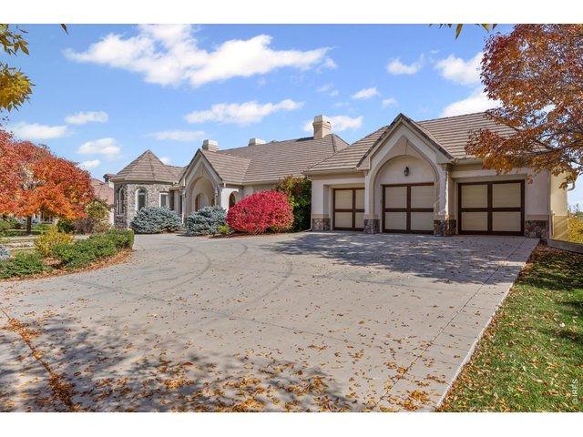 Property Photo 4 4-Car Attached Garage with 1,168 sq ft