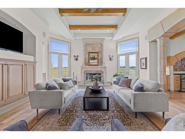 Property Photo 8 Living Room with Fireplace
