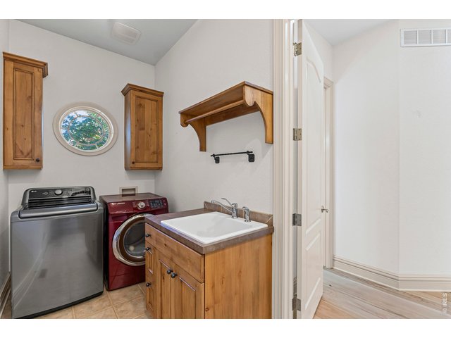 Property Photo 15 Main Floor Laundry Room (washer & dryer included)