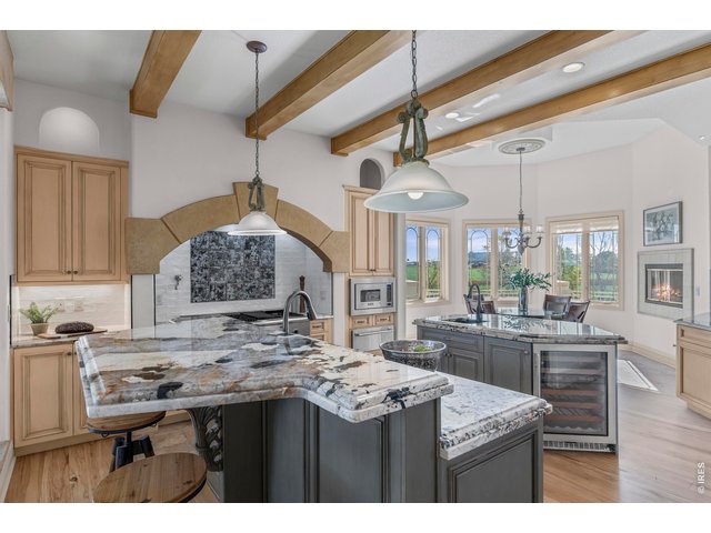 Property Photo 22 Kitchen to In-Kitchen Dining Area