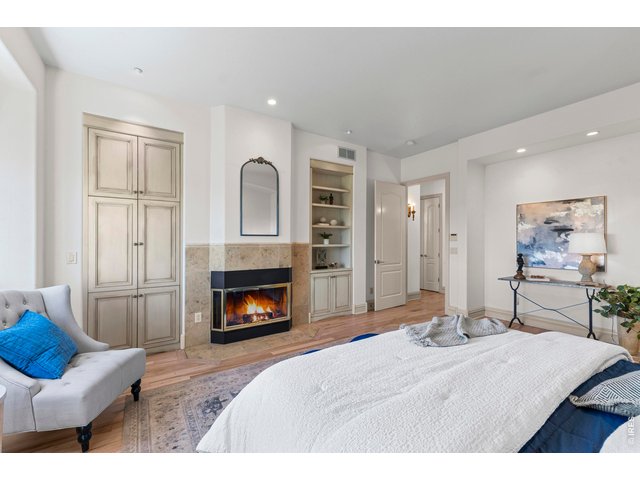 Property Photo 25 Primary Bedroom with Gas Fireplace