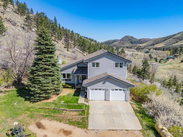 Property Photo 1 Welcome to your new mountain home! Just a short drive to Loveland and Fort Collins. This home encompasses the mountain lifestyle you've been waiting for!