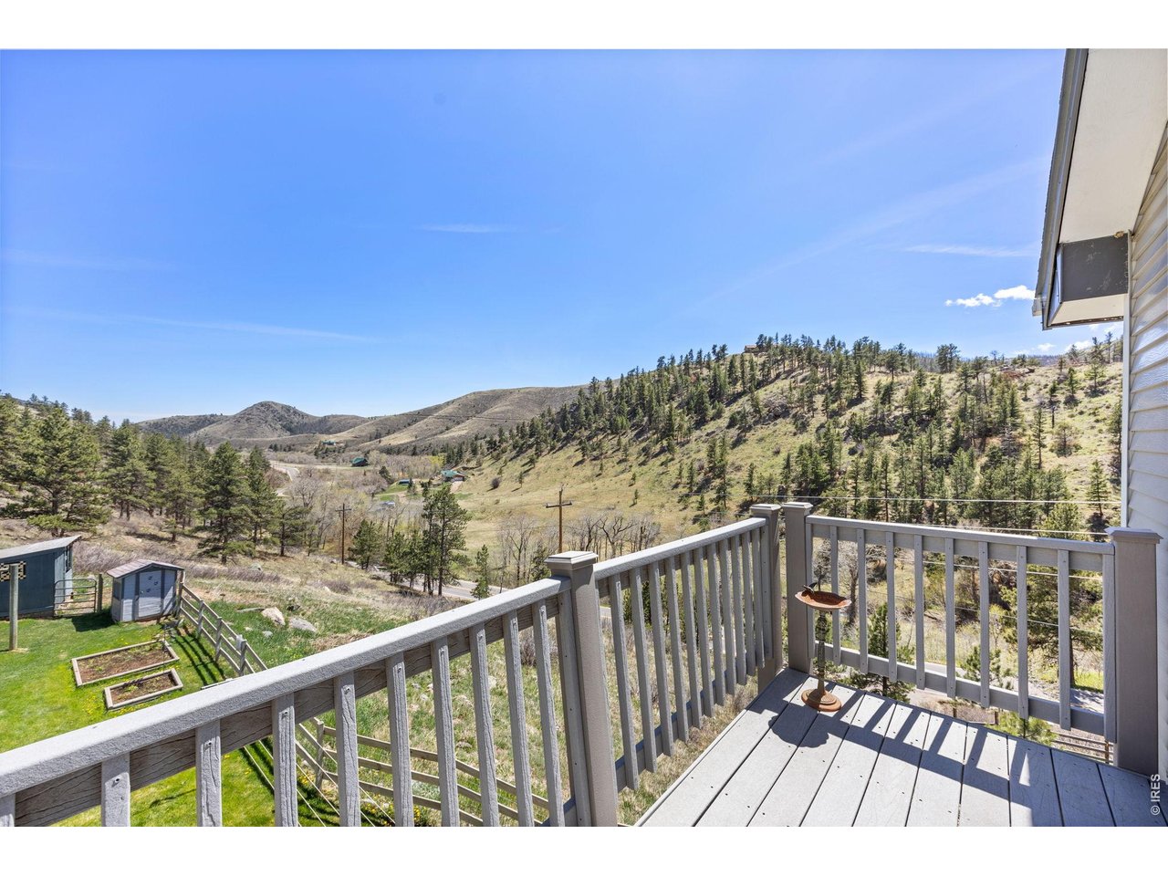 Relax on the expansive back deck while watching mule deer and ample wildlife roam the property. Full deck off of primary bedroom and lower level!