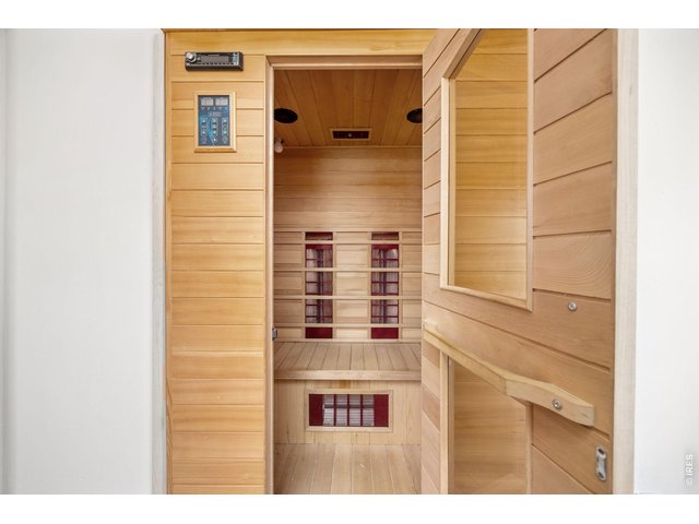 Property Photo 26 The walk-out basement includes a custom workshop, bonus room (perfect for an office or gym), walk-in sauna, storage, and space to expand.