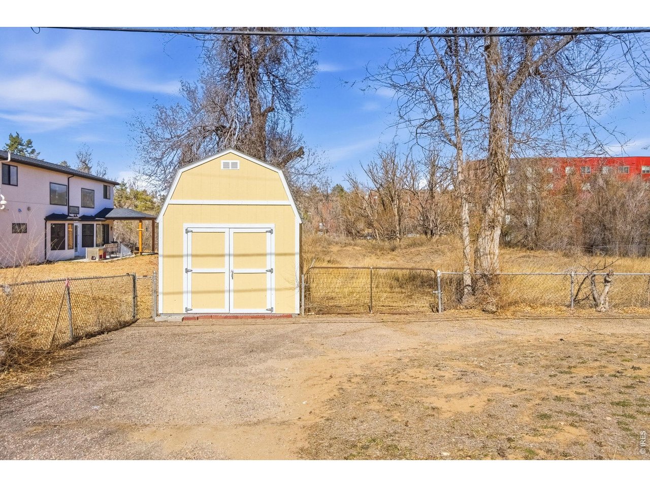Detached Shed included! Chain link fence in place enclosing the front portion of the property making it great for your pets!