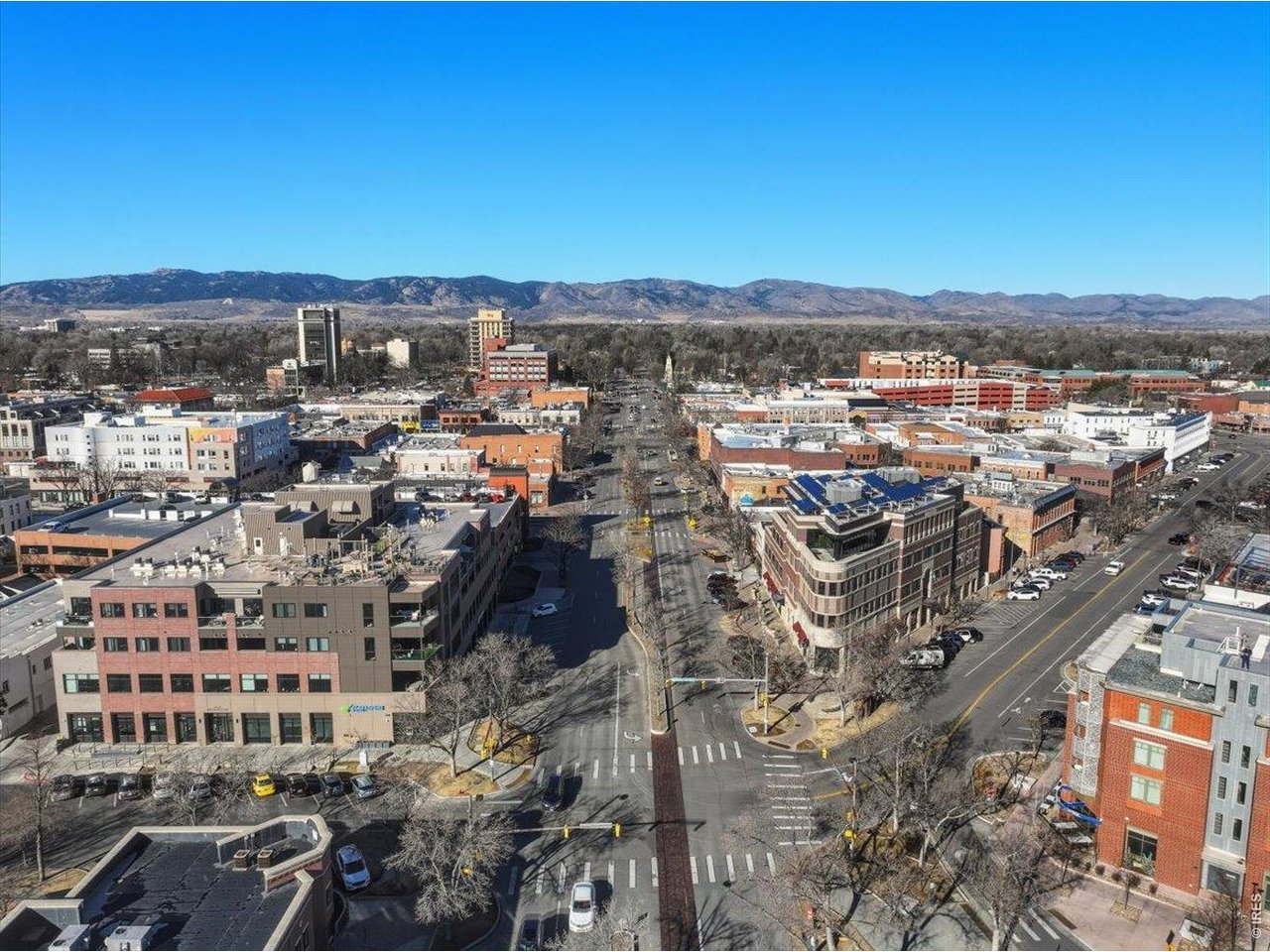 Location! Location! Location! Located a stones throw from Old Town and offering a roof top deck for views.