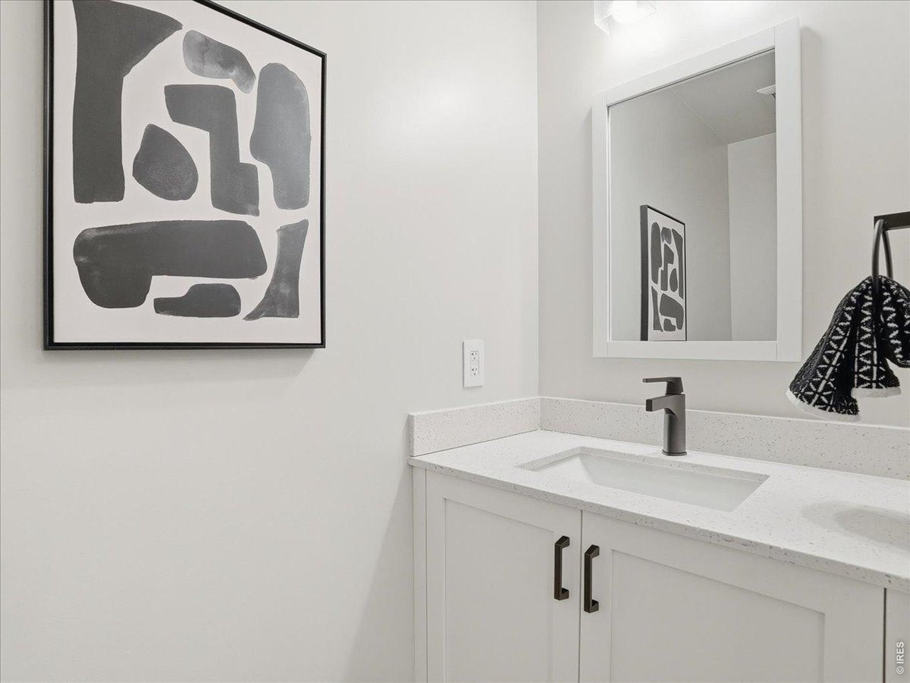 Clean, contemporary guest bath with a polished look.