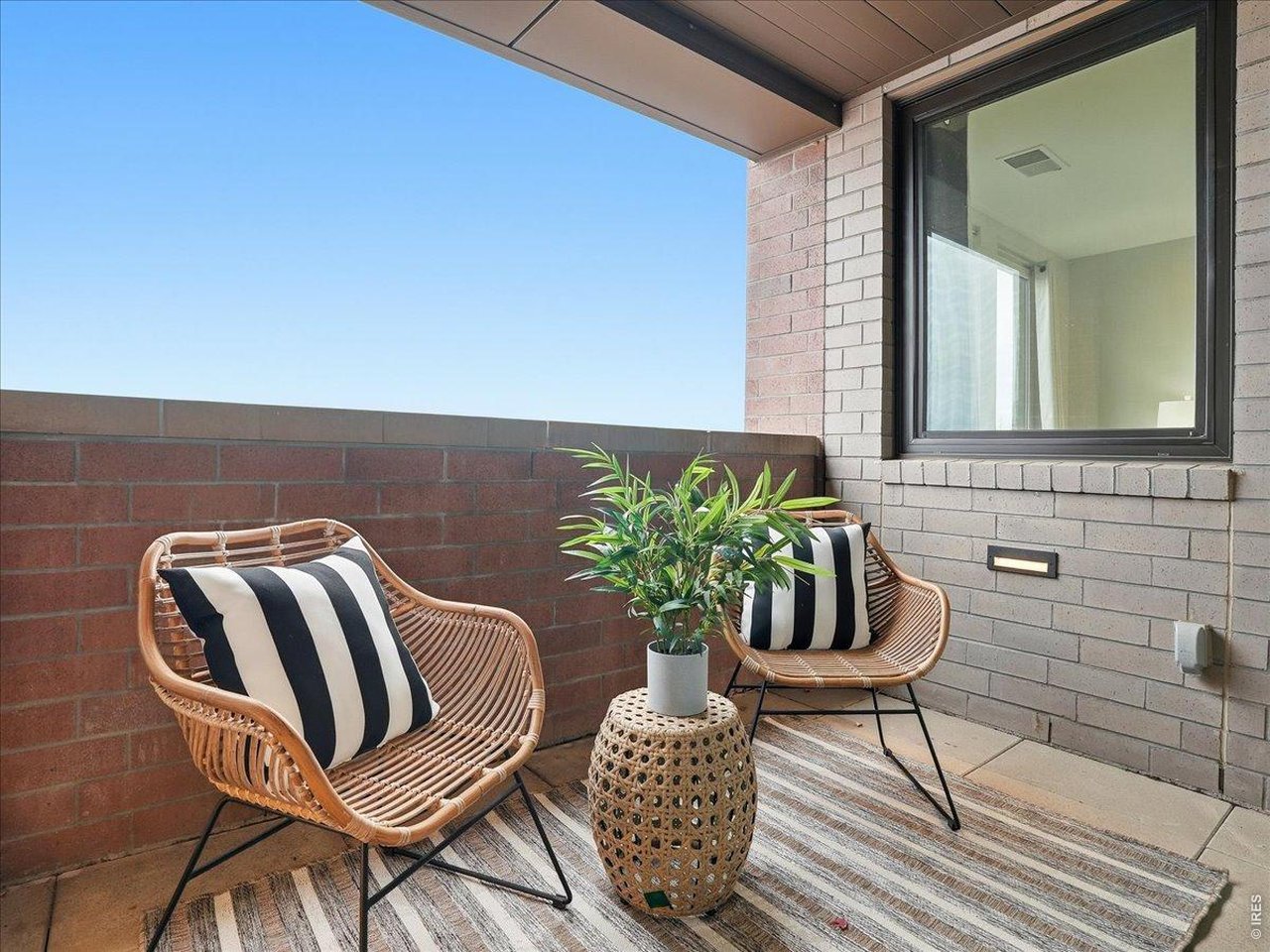 Private enclosed patio. A perfect spot for morning coffee or evening relaxation.