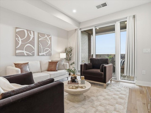 Property Photo 1 Light-filled living space
