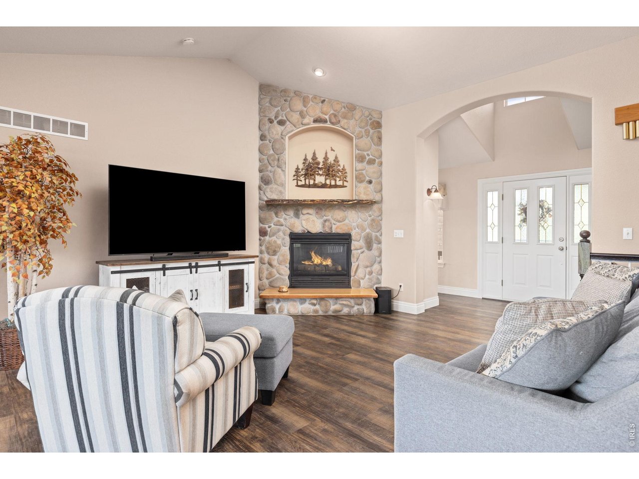 With gas fireplace and updated mantel and hearth.