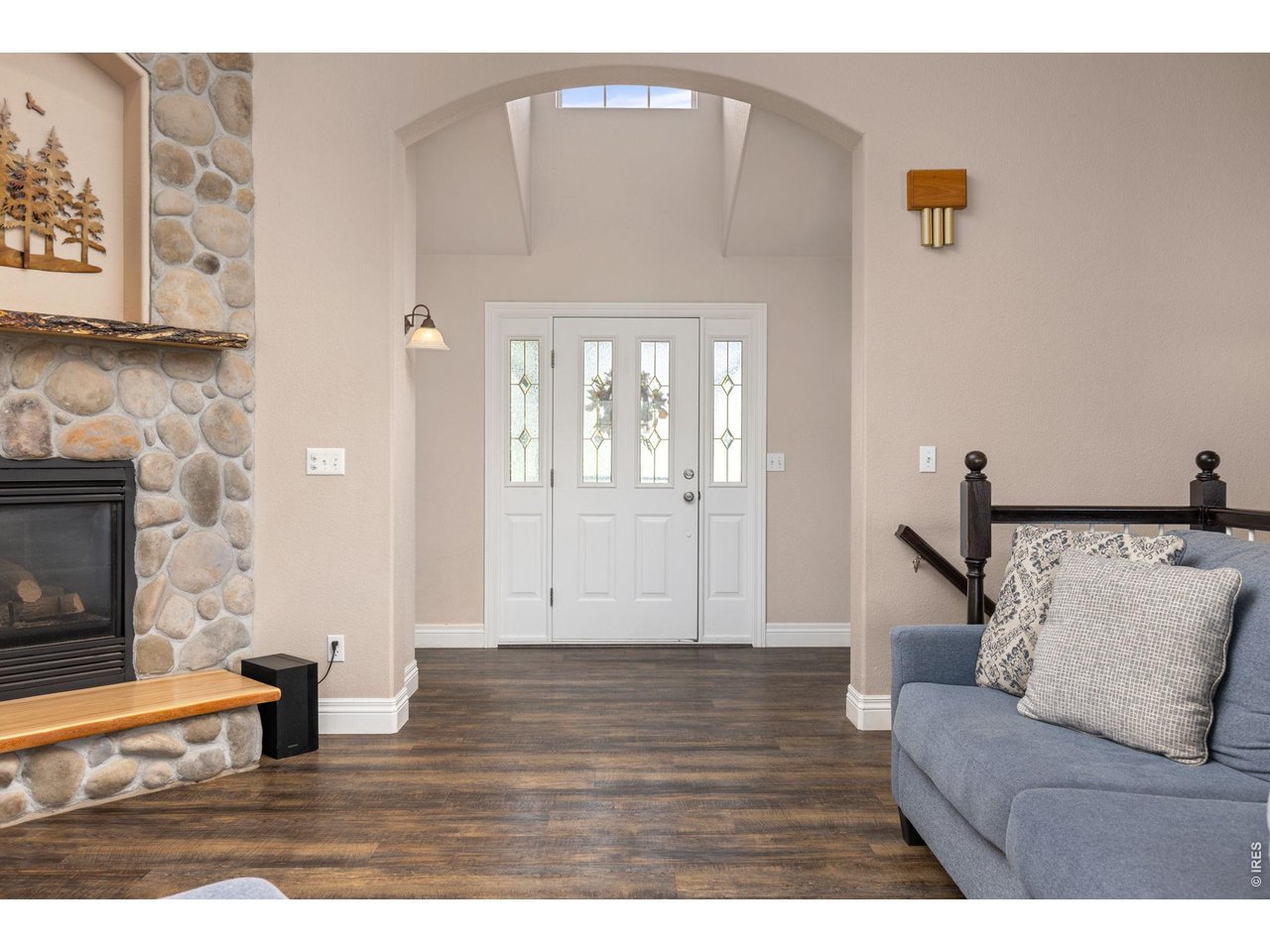 Step into the main entry and living room.