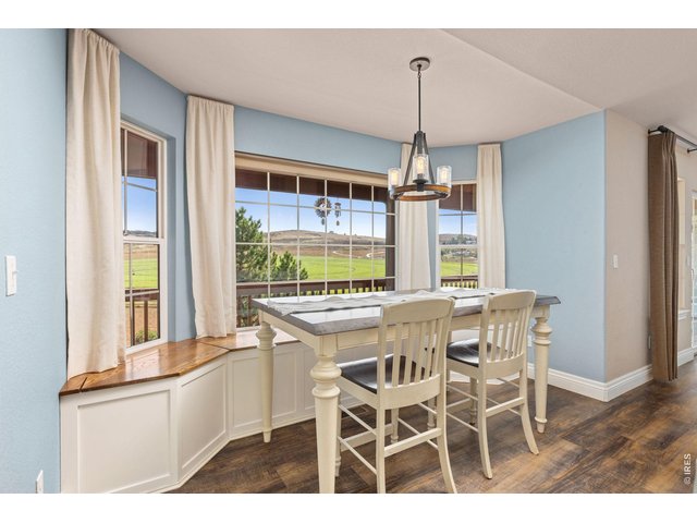 Property Photo 14 Eat-in Kitchen Dining Space with Custom Bench/ Window Seat