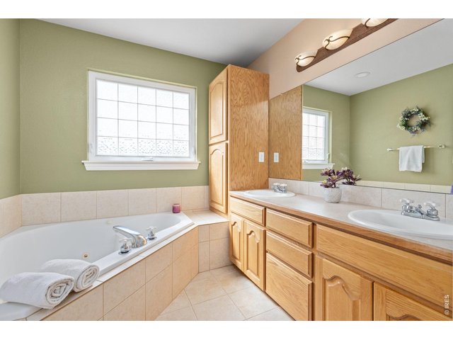 Property Photo 18 Primary 5 Piece Bathroom