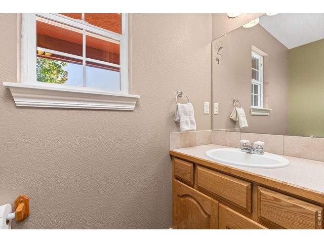 Property Photo 23 Half Bath off the Laundry Room