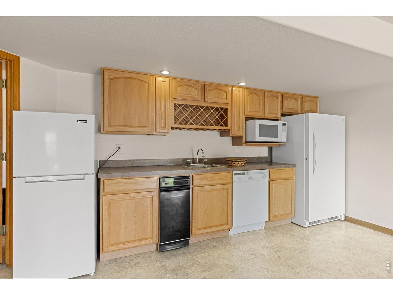 With a full Kitchenette