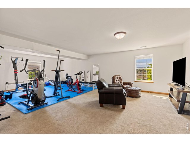 Property Photo 27 Currently being used as a Rec Room and Home Gym