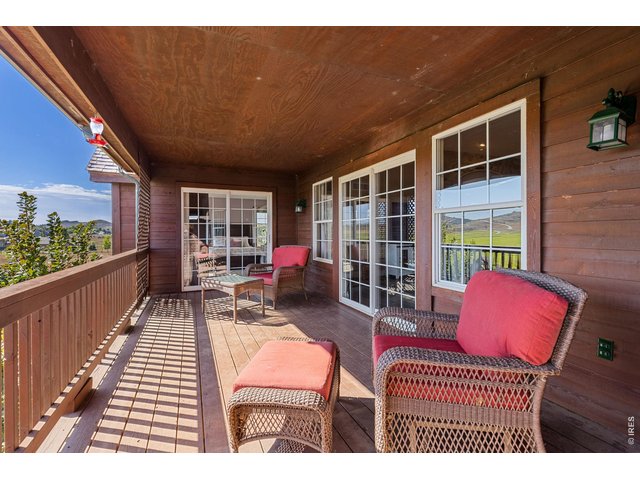 Property Photo 31 Large Covered Deck off the Back of the Home for Entertaining and Taking in the Views and Sunrises to the East