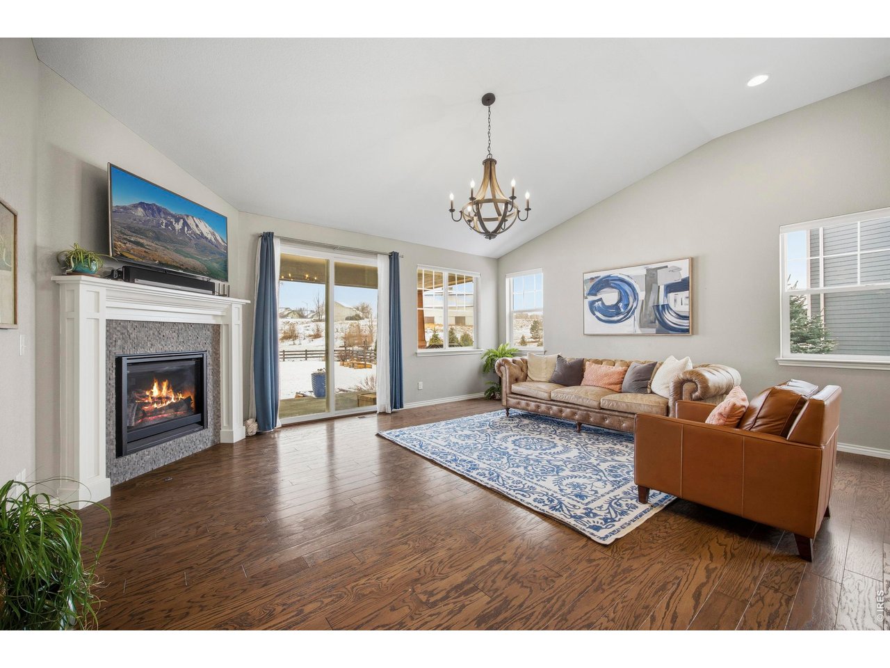 Great room with gas fireplace. Southern exposure