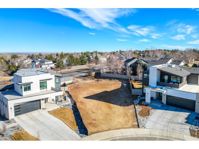 Property Photo 2 12,331 SQ FT Lot Perfect For A Ranch Style Home or A Two Story With A Main Floor Primary Bedroom. Both Can Have A Walkout Basement and a 3 Car Garage.