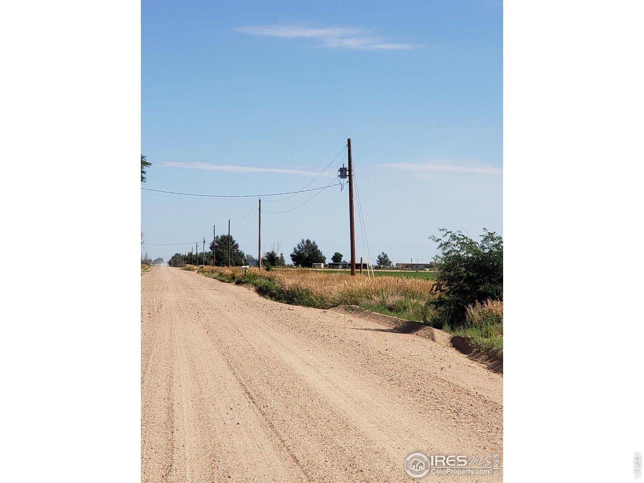 Property view North West of property - Power availability across County Road 6