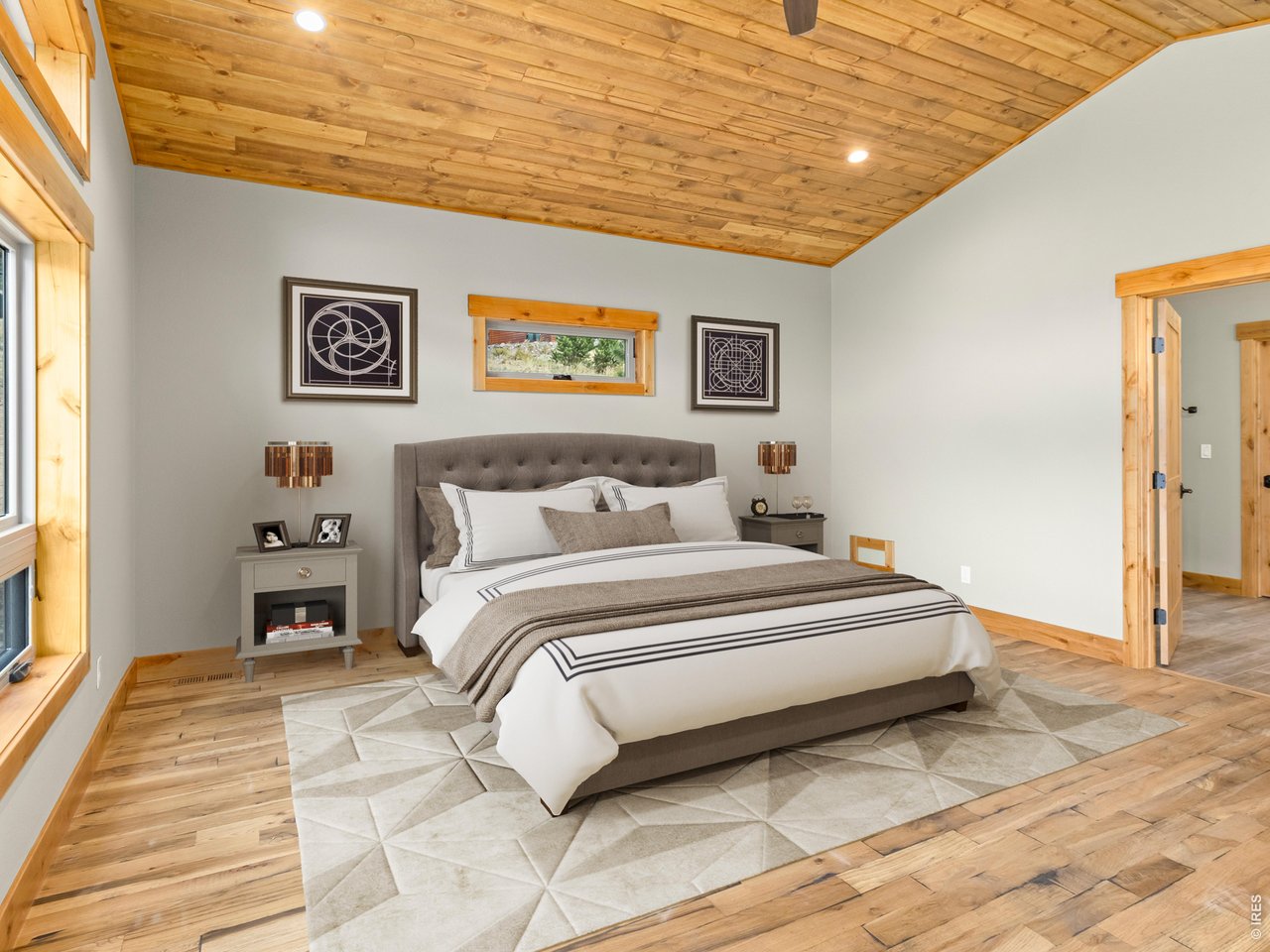 Hardwood flooring and vaulted ceiling