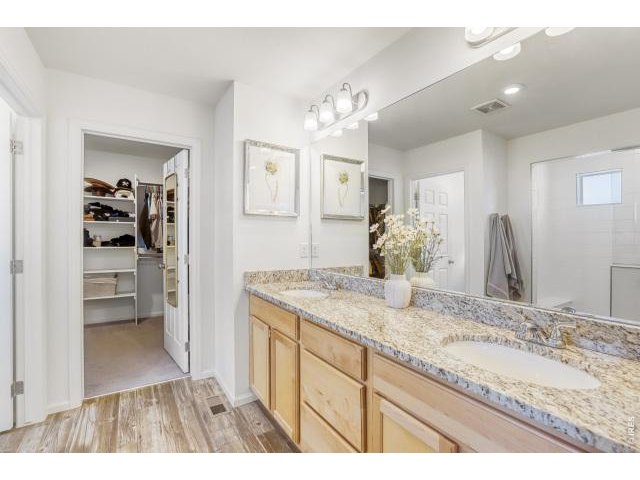 Property Photo 13 Double sink vanity in Primary bath with attached walk-in closet