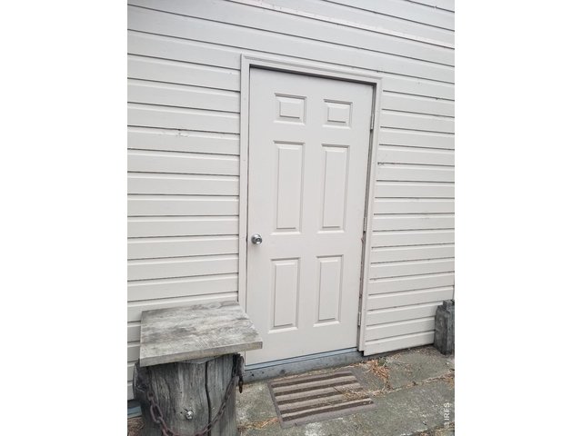 Property Photo 26 Door to outside laundry room