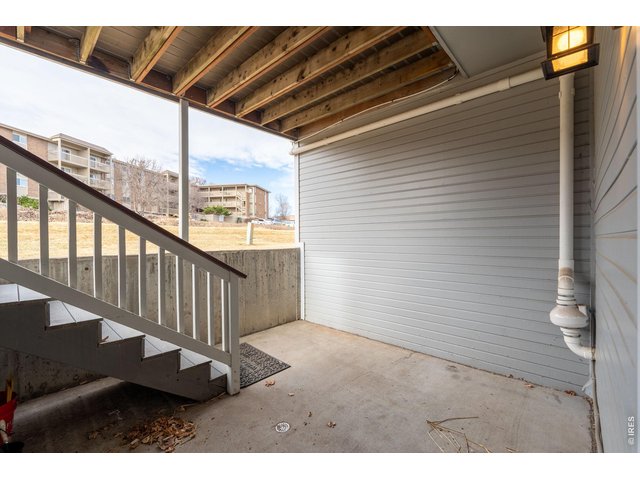 Property Photo 39 Covered Back Patio - Note the radon mitigation system on the right.