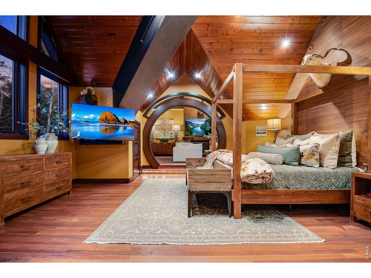 Primary bedroom expands the entire East side of this custom built estate