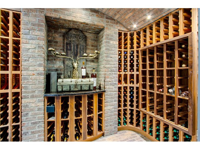Property Photo 30 A stone, walk-in wine cellar provides plenty of space for your collection.