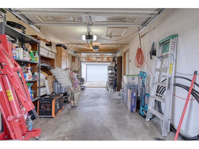 Property Photo 22 One car attached garage (drive thru)