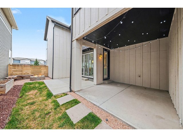 Property Photo 27 Covered patio, private and secluded backyard oasis 