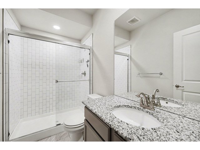 Property Photo 25 The perfect secondary full bath w/custom tile