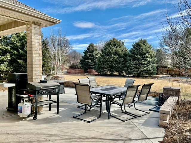 Property Photo 5 Patio & View of Back Yard