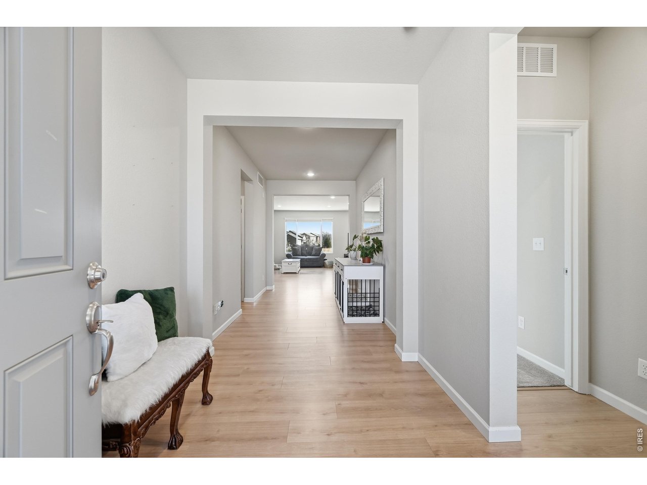 Greet guests in the beautiful entry