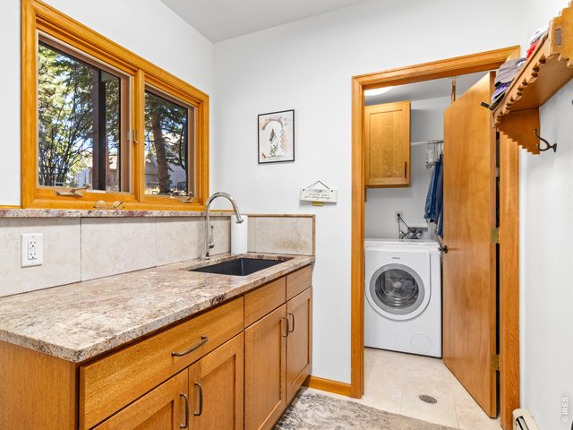 Property Photo 19 Mud Room Extends the Laundry Room