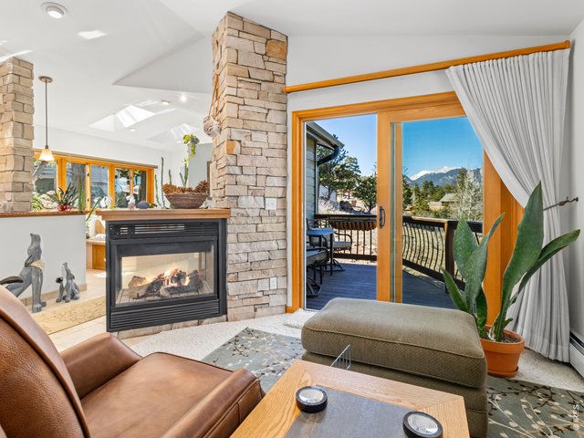 Property Photo 9 Private Seating Area and Balcony with Views of the Mummy Range
