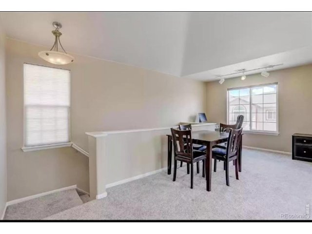 Property Photo 4 Great space includes a nice dining area.