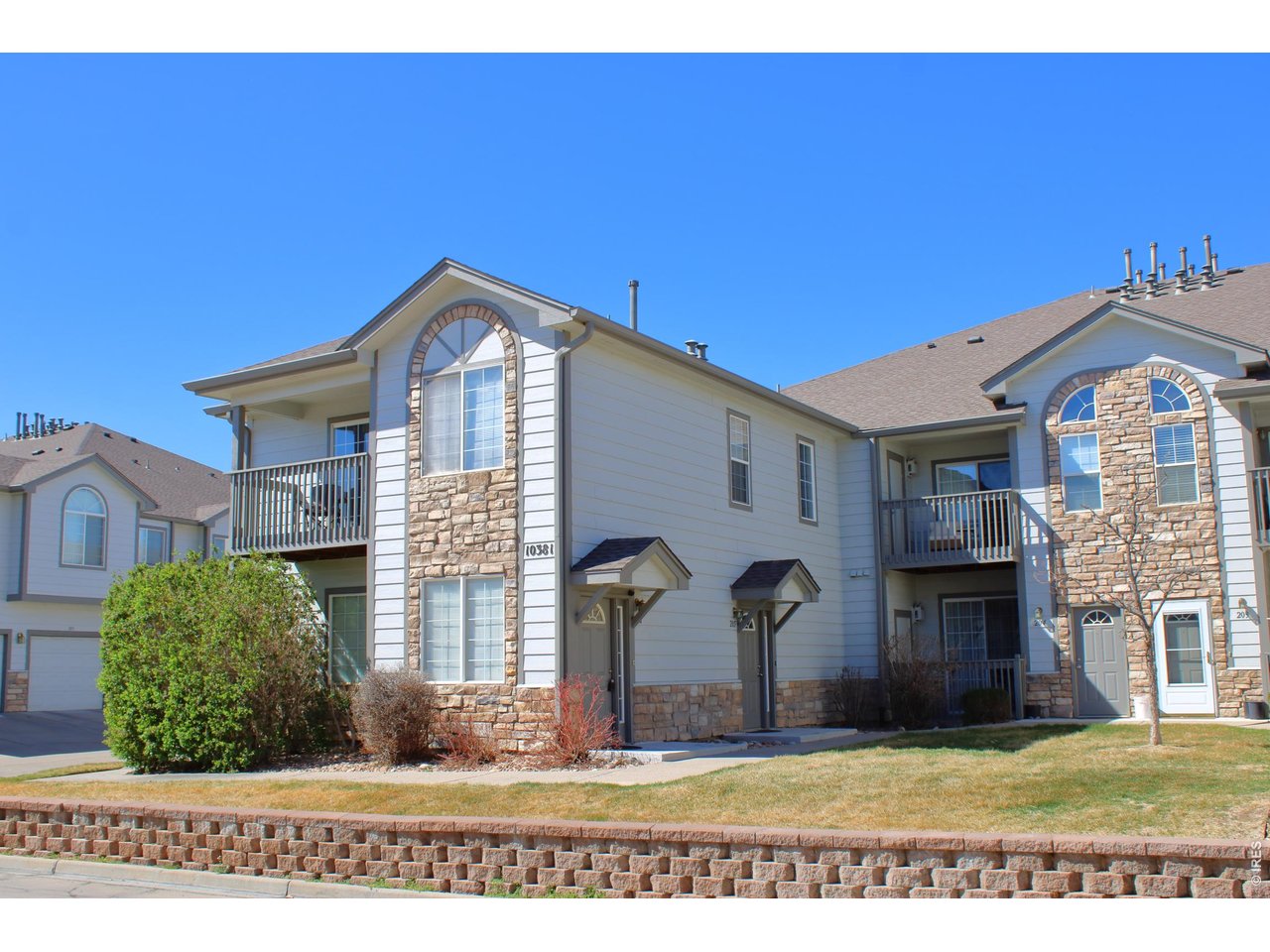 Second floor unit with main level private entrance just off the shared courtyard.